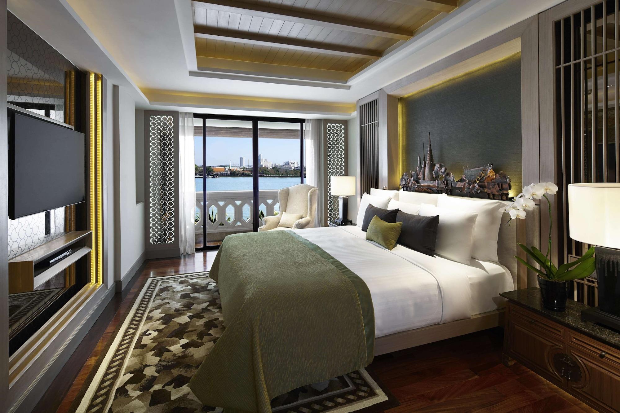 Anantara Riverside Bangkok Resort Exterior foto A bedroom at the hotel
