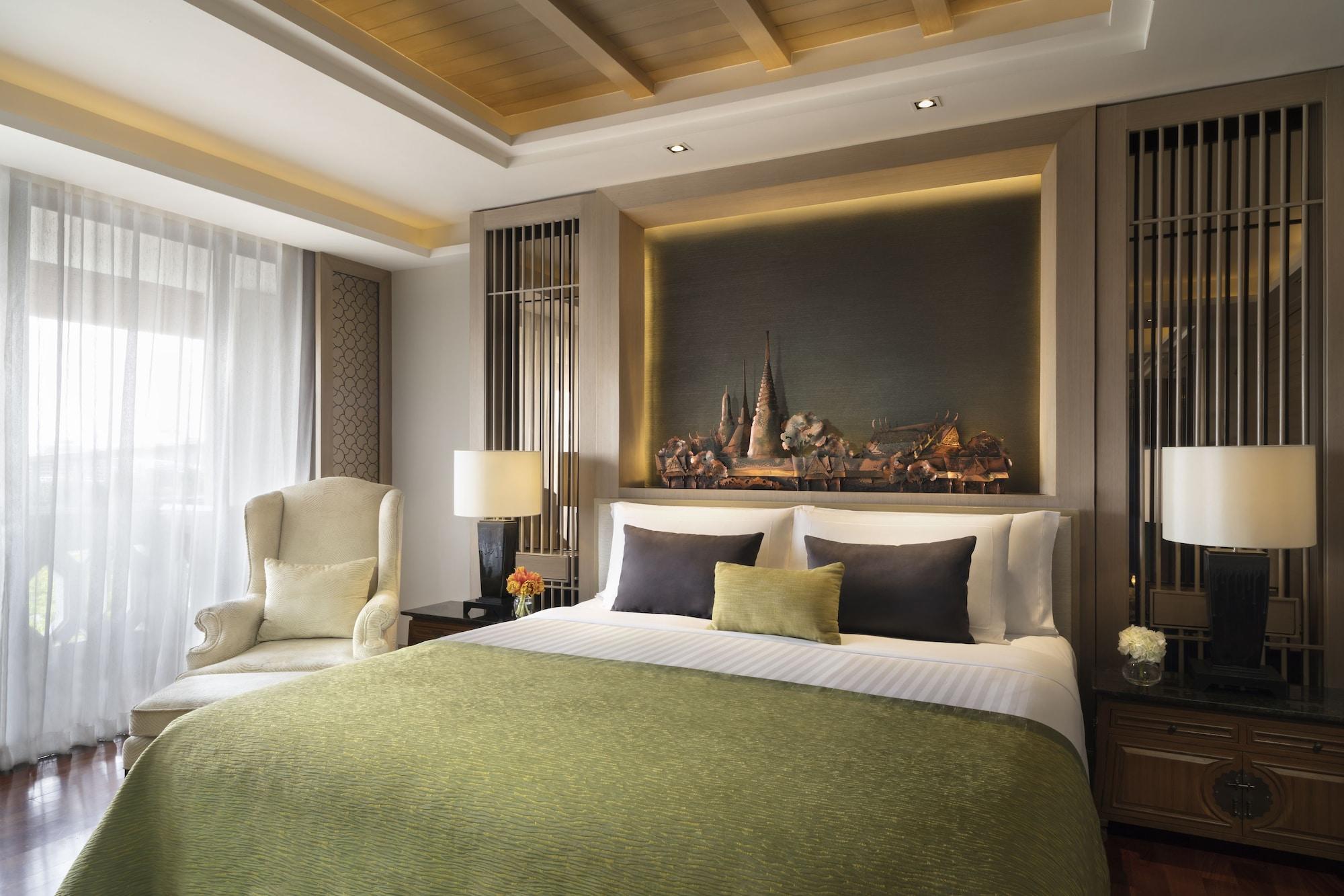 Anantara Riverside Bangkok Resort Exterior foto A bedroom at the hotel